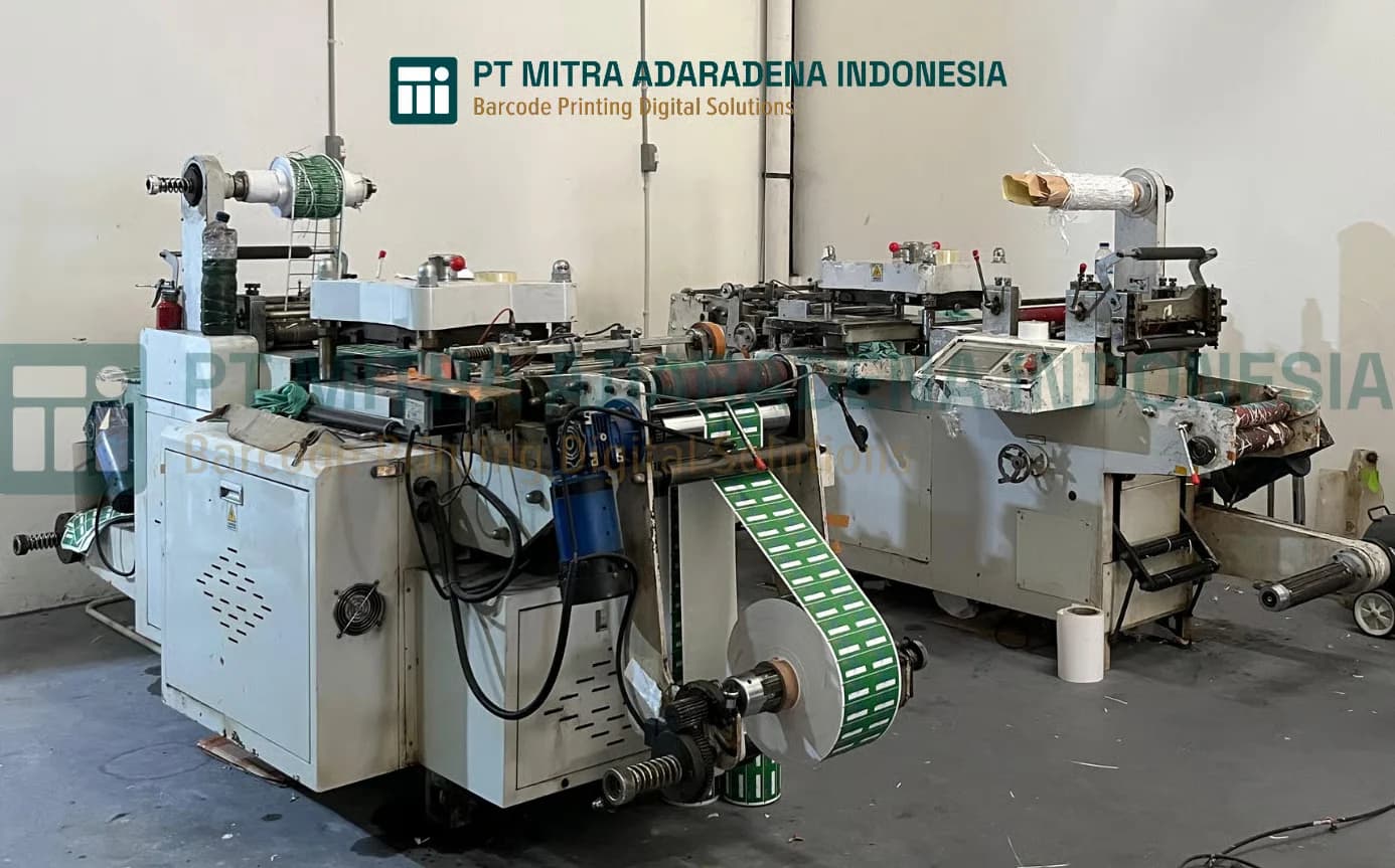 The die-cut machine stripping waste matrix from a printed label web