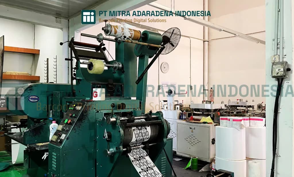 The Shiki label press running printed label stock